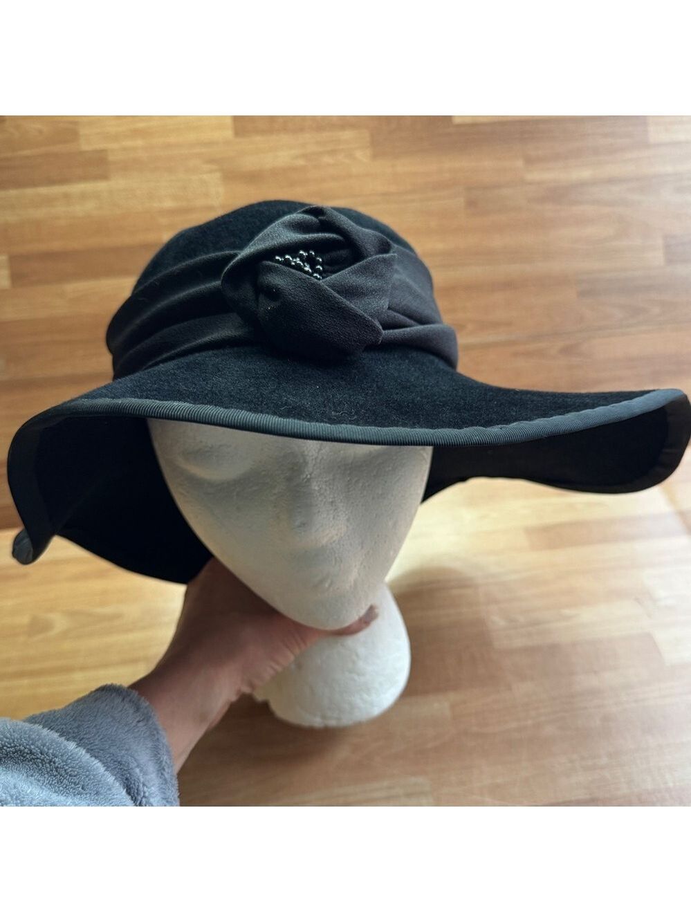 black wool felt cloche hat with a flower accent vintage